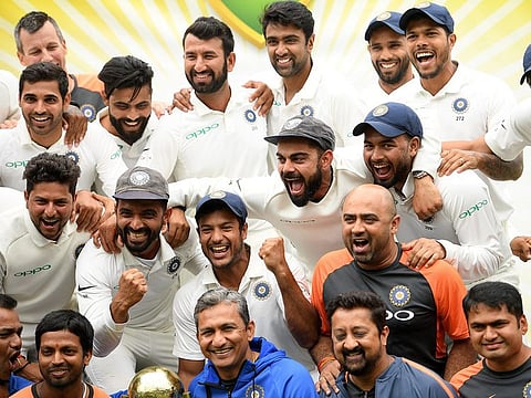 The Indian team celebrates a 2-1 series victory over Australia at the SCG in Sydney, Australia, January 7, 2019. 