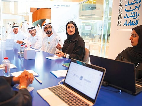 Shaikh Mohammad and Shaikh Hamdan watch a presentation at the Mohammad Bin Rashid University of Medicine and Health Sciences yesterday.