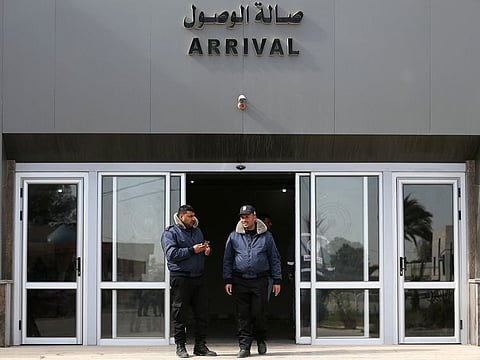 Palestinian Hamas-hired policemen stand at Rafah border crossing with Egypt, in the southern Gaza Strip 