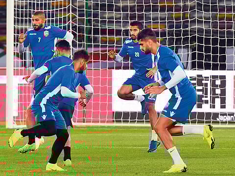 Bahraini players during training yesterday at Zayed Sports City stadium in Abu Dhabi before today’s crucial encounter.