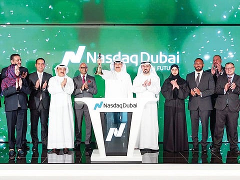 DIFC governor Eisa Kazim rings the bell at Nasdaq Dubai on Wednesday during the launch of Saudi equity futures in 12 companies with a market capitalisation of 794 billion Saudi riyals.