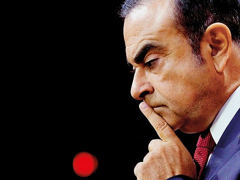 Carlos Ghosn, Chairman and CEO of the Renault-Nissan Alliance, reacts during a news conference in Paris, France, September 15, 2017.