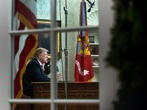 President Trump speaks to the nation in his first-prime address from the Oval Office of the White House on Tuesday.