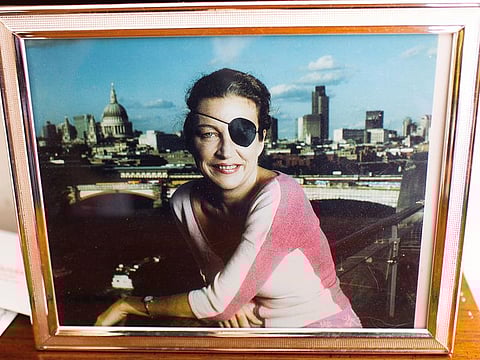 A portrait of Marie Colvin in the living room at the family home in East Norwich, New York