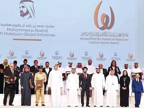 Shaikh Hamdan and Shaikh Ahmad Bin Mohammad Bin Rashid Al Maktoum, Chairman of MBR Creative Sports Awards, with Mohammad Salah and other awardees during the awards ceremony at World Trade Centre on Thursday. 
