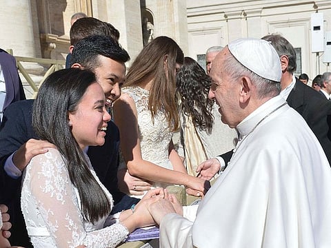 Pope Francis giving his blessing to newlywed Dubai expats Jonathan Eric and Kristine Tara Defante in 2017. The couple were selected for the Sposi Novelli custom at the Vatican.