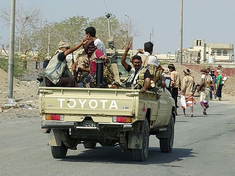 Members of the Yemeni pro-government forces gather at the eastern entrance of the port city of Hodeida on December 30, 2018.