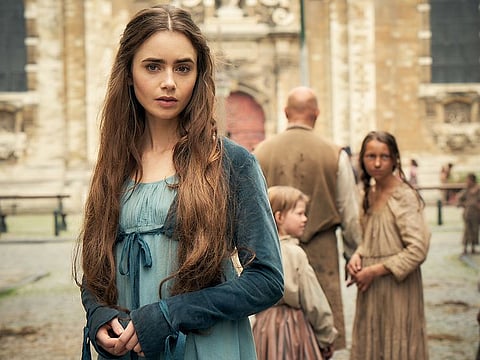 Lily Collins as Fantine