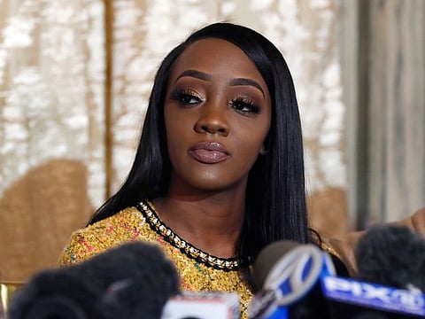 Faith Rodgers appears during a news conference about R&B singer R. Kelly in New York, Monday, Jan. 14, 2019.