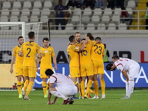 Australia celebrate their 3-2 win in the 2019 AFC Asian Cup group B football match between Australia and Syria at the Khalifa Bin Zayed stadium in Al Ain on January 15, 2019.