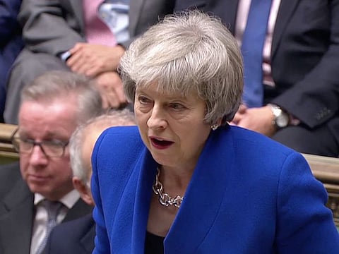 British Prime Minister Theresa May speaks after winning a confidence vote.