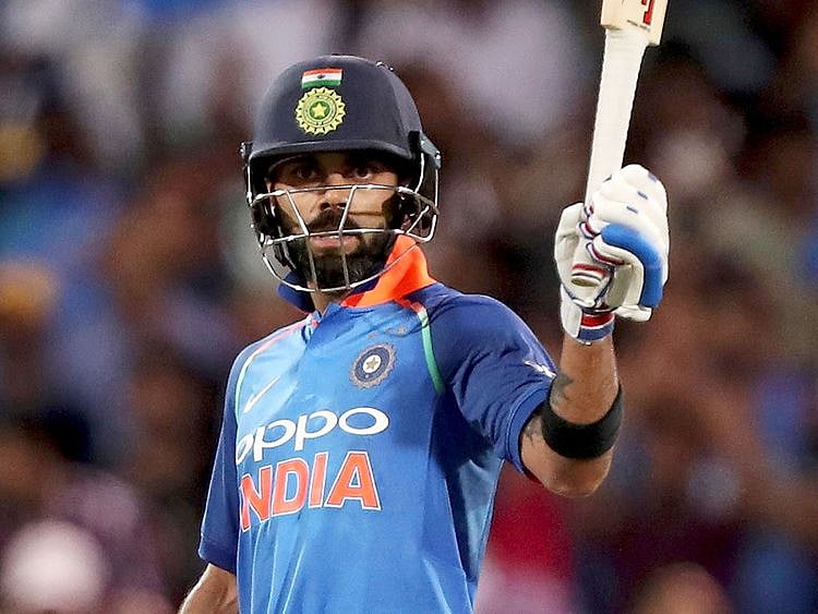 Virat Kohli celebrates