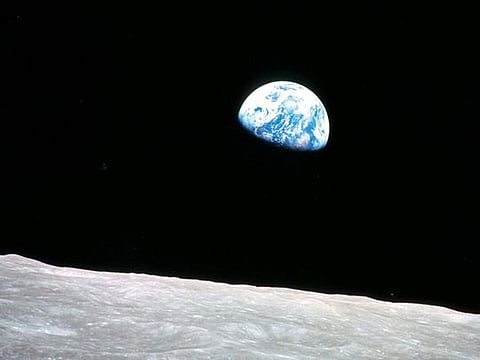 The earth from Apollo 8 as it rounded the dark side of the moon 