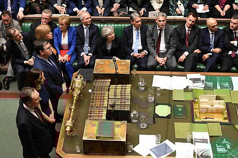 British Prime Minister Theresa May looks on as MP's announce that she has lost a vote on her Brexit plan,  on Tuesday January 15, 2019.
