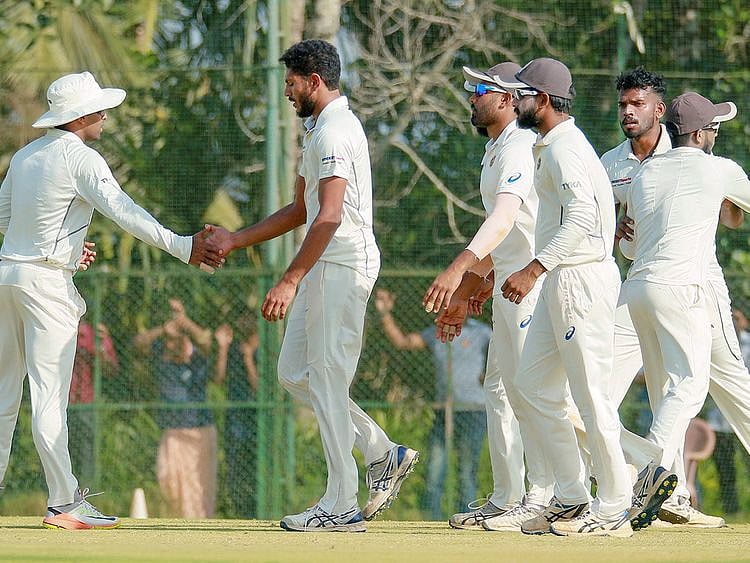 Kerala team members celebrate