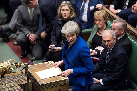 British Prime Minister Theresa May speaks during a confidence vote debate after Parliament rejected her Brexit deal, in London, Britain, January 16, 2019.