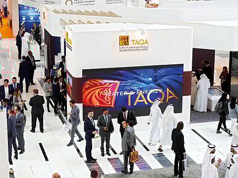 Visitors tour the Taqa Pavilion during the Abu Dhabi Sustainability Week at Adnec. Taqa is currently active in 11 countries including the UAE, Canada, Ghana, India, Morocco and US.