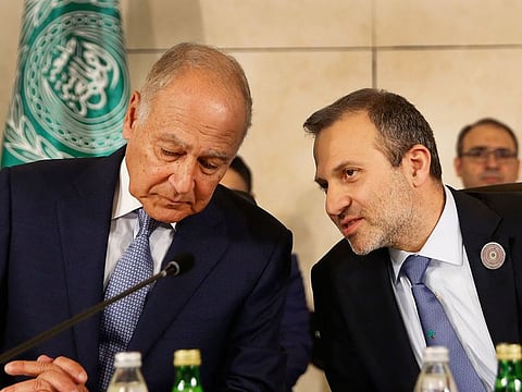 Lebanese Prime Minister Gibran Bassil, right, speaks with Arab League Secretary-General, Ahmad Aboul Gheit, left, during the opening session of the Arab foreign ministers meeting ahead of a weekend Arab Economic Summit, in Beirut, Lebanon, on Friday, January 18, 2019. 