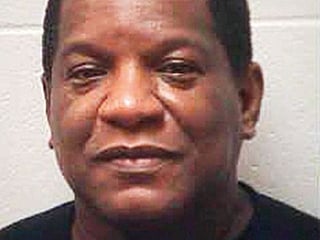 R Kelly’s manager surrenders after threat to kill