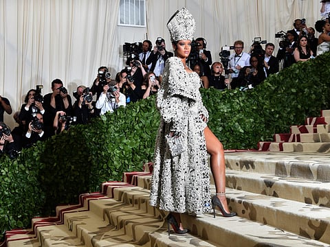 In this file photo taken on May 8, 2018 Rihanna arrives for the 2018 Met Gala at the Metropolitan Museum of Art in New York.