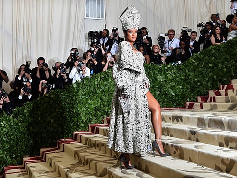 In this file photo taken on May 8, 2018 Rihanna arrives for the 2018 Met Gala at the Metropolitan Museum of Art in New York.