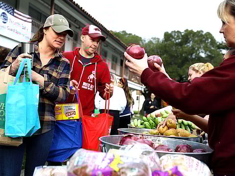 Coast Guard families affected by the government shutdown lined up for free food in Novato, Calif.