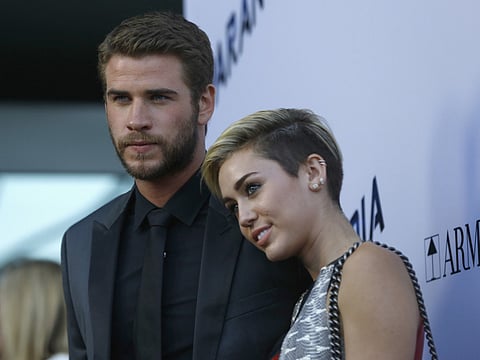 Liam Hemsworth and Miley Cyrus.