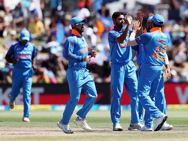 India's Bhuvneshwar Kumar (C) celebrates