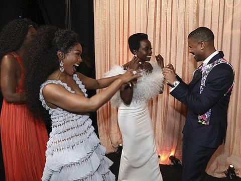 Angela Bassett, from left, Danai Gurira and Michael B. Jordan celebrate "Black Panther" winning the award for outstanding performance by a cast in a motion picture at the 25th annual Screen Actors Guild Awards at the Shrine Auditorium & Expo Hall on Sunday, Jan. 27, 2019, in Los Angeles