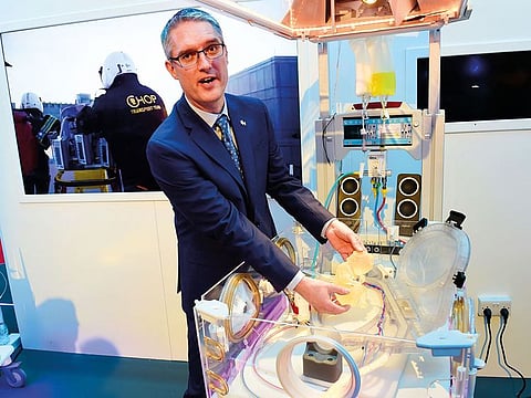 Marcus G. Davey, senior research investigator at the Children’s Hospital of Philadelphia, demonstrate a womb-like device called Extend, for premature babies who need a ventilator.