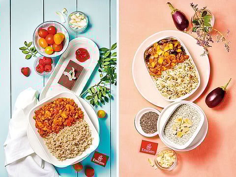 Food being served in business class (left) and economy class