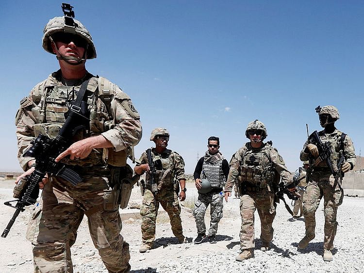 US troops patrol at an Afghan National Army