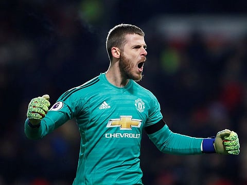 Manchester United's David de Gea celebrates after Victor Lindelof scores their second goal.