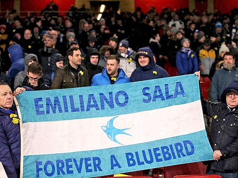 Cardiff City fans hold a banner in the stands, reading 'Emiliano Sala Forever a Bluebird',  ahead of the match against Arsenal.