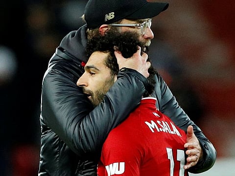 Liverpool manager Juergen Klopp, nominated for best coach's honours, with Mohammad Salah after the Uefa Champions League win earlier this year.