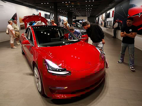 A Tesla showroom in the Cherry Creek Mall in Denver. Tesla on Tuesday said it is slashing battery costs to speed a global shift to renewable energy, and could have a $25,000 model available in three years or so.