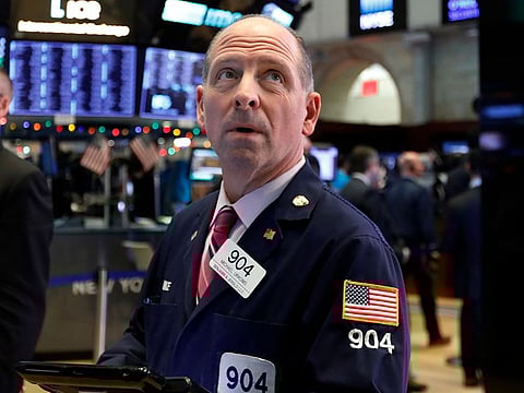 Trader Michael Urkonis works on the floor of the New York Stock Exchange.