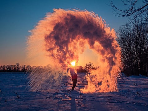 Twitter users from the US are sharing pictures of hot water "instantly turning into snow".