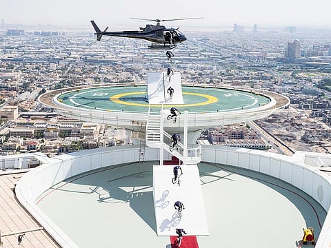 A sequence showing Kriss Kyle jumping off a helicopter on the helipad of the Burj Al Arab.