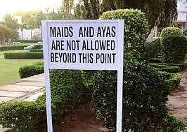 A signboard restricting domestic workers' entry to a club in Pakistan.