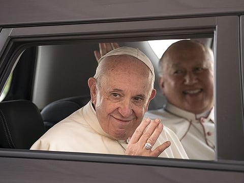 Pope Francis attends a welcome ceremony at the Presidential Palace in Abu Dhabi. 