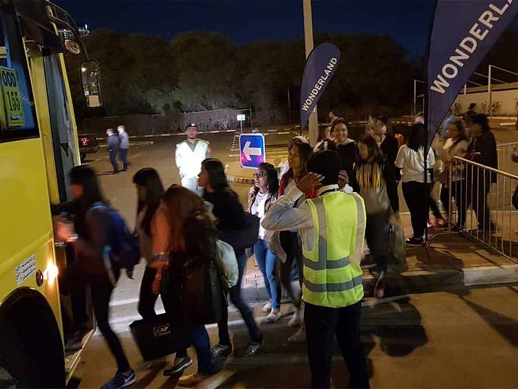 People boarding buses for Papal mass from Al Boom tourist village