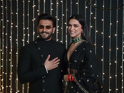 Ranveer Singh (L) and Deepika Padukone