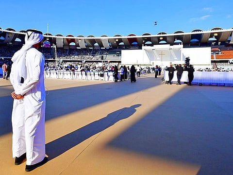 An Emirati volunteer during the Papal Mass on Tuesday. Volunteers were selected from different organisations, irrespective of religion and nationality.