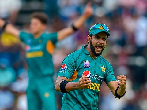 Pakistan's Imad Wasim celebrates after catching out South Africa's Rassie van der Dussen.