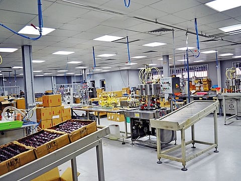 The production line at the My Perfumes factory in Al Ghusais. It took nearly eight months to come up with a formulation that could provide all of the needed features.