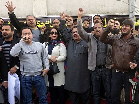 Pakistan journalists chant slogans during demonstration to condemn the arrest of their colleague Rizwan-ur-Rehman Razi, in Lahore, Pakistan, Saturday, Feb. 9, 2019. 