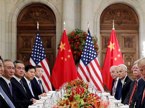  U.S. President Donald Trump, U.S. Secretary of State Mike Pompeo, U.S. President Donald Trump's national security adviser John Bolton and Chinese President Xi Jinping attend a working dinner after the G20 leaders summit in Buenos Aires, Argentina on December 1, 2018