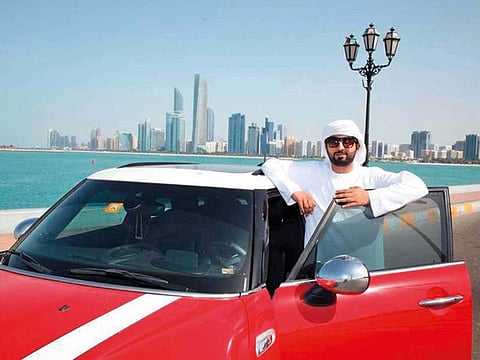 Abed Al-Belooshi, a helicopter pilot by profession, also doubles up as an Uber driver