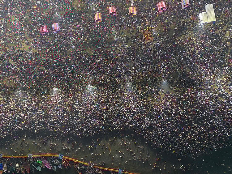 Devotees taking a holy dip at the Sangam